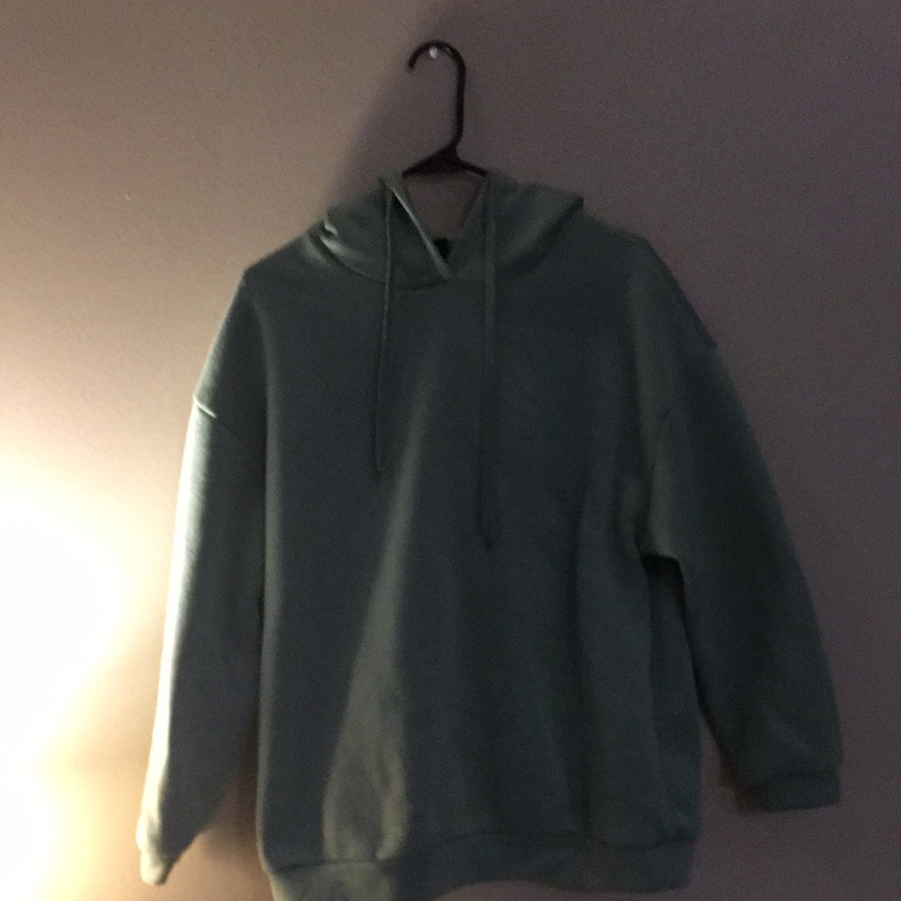 Love never fails hoodie